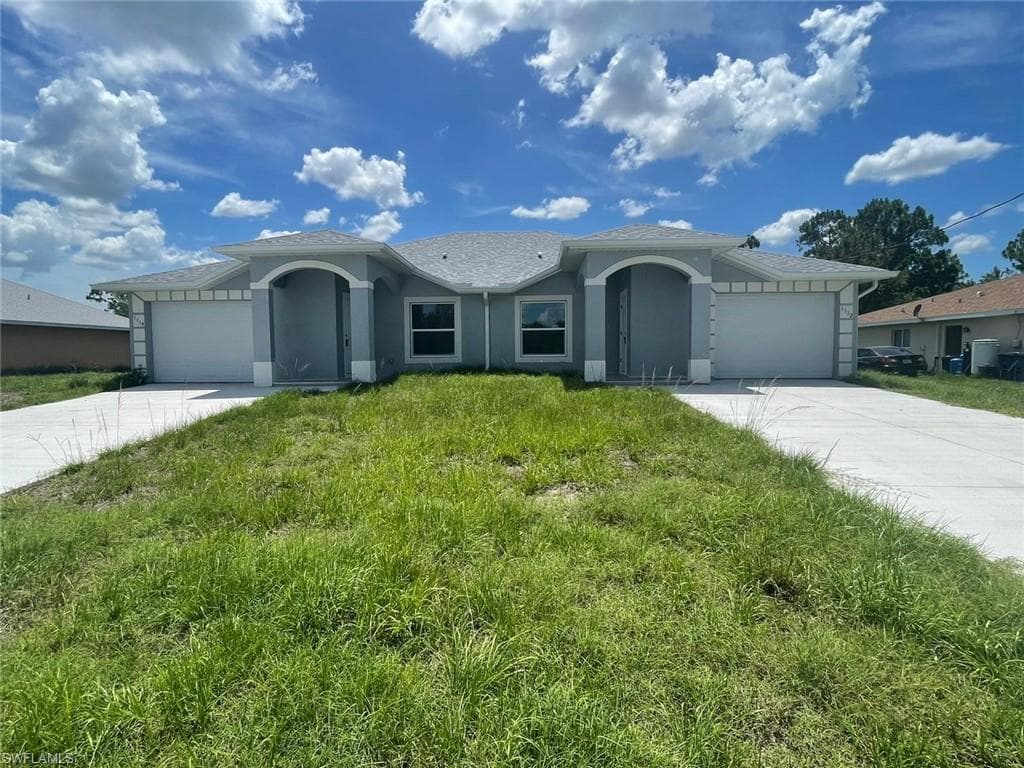 1112/1114 IVAN AVE S LEHIGH ACRES, FL 33973