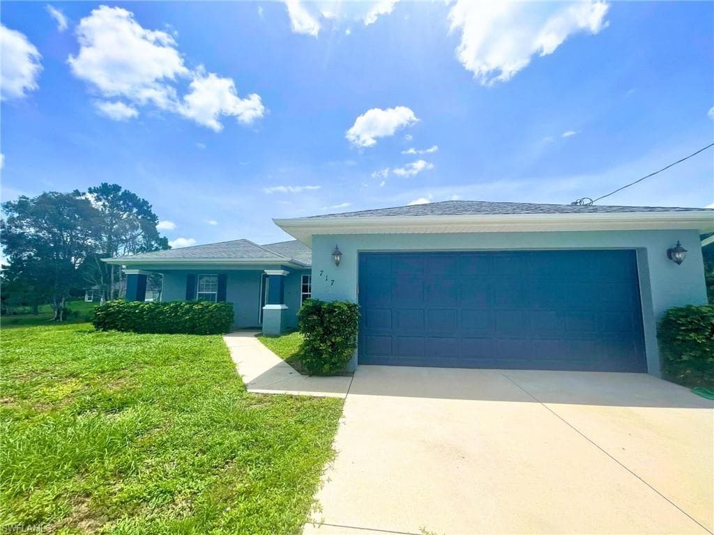 717 Knox AVE S LEHIGH ACRES, FL 33974