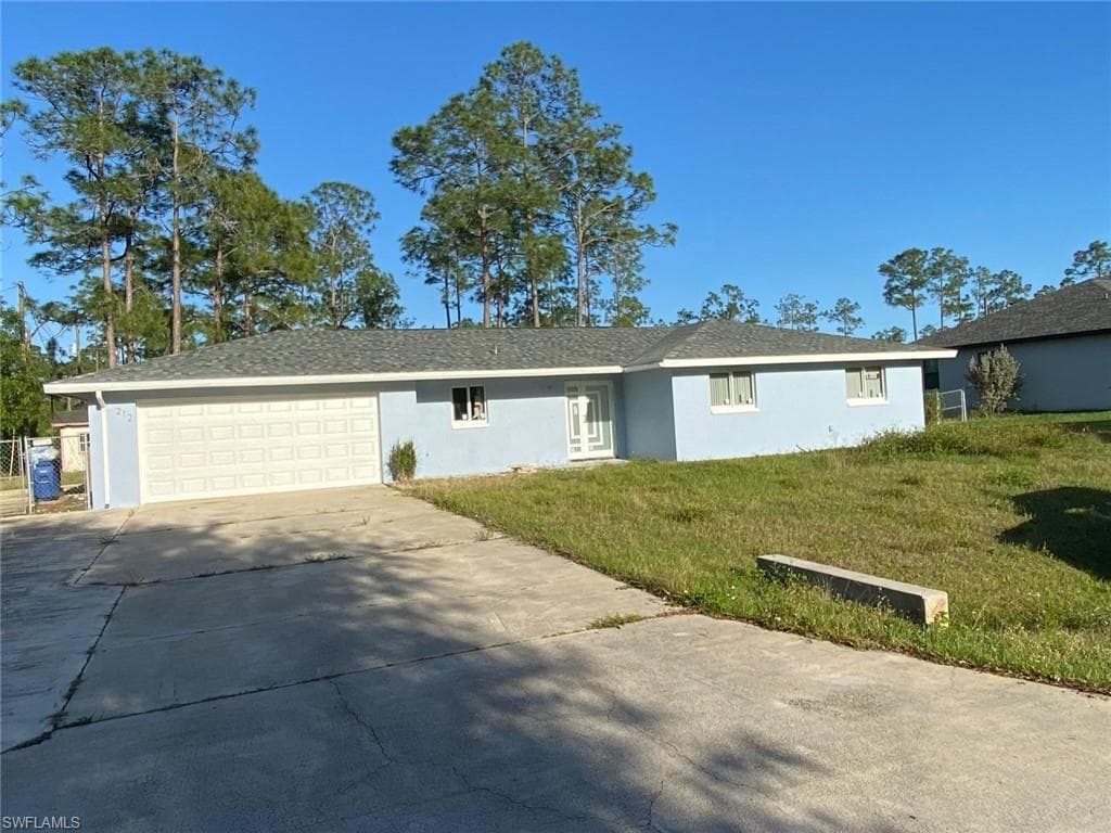 212 Grant AVE LEHIGH ACRES, FL 33936