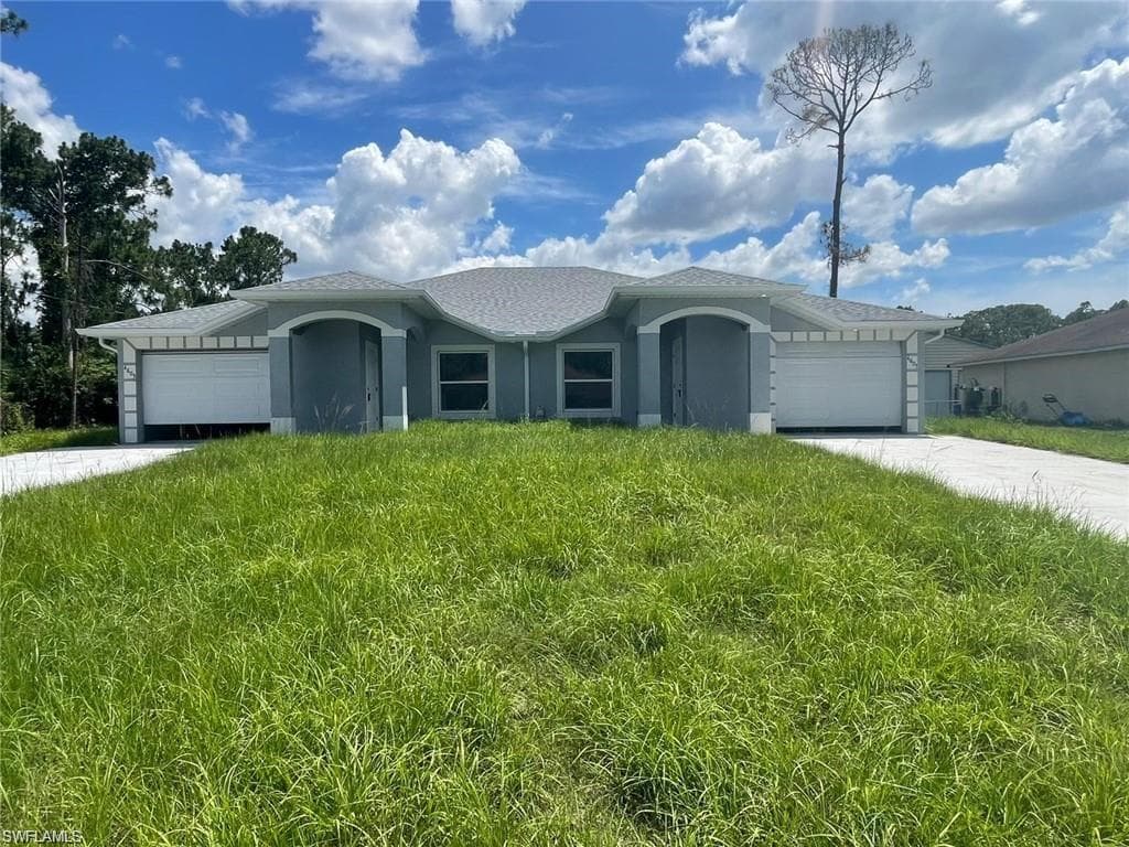 397/399 Carrillon AVE S LEHIGH ACRES, FL 33974