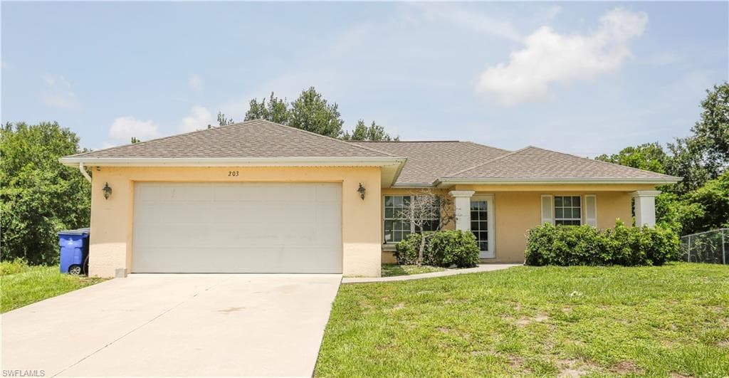 203 Jack AVE N LEHIGH ACRES, FL 33971