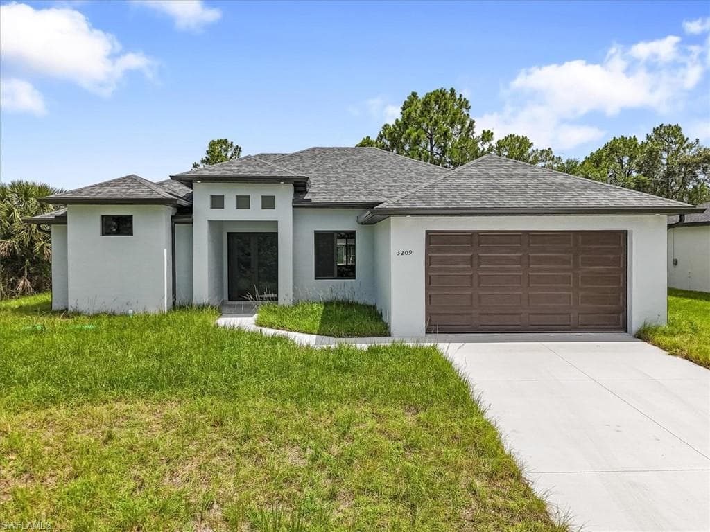 3209 39th ST SW LEHIGH ACRES, FL 33976