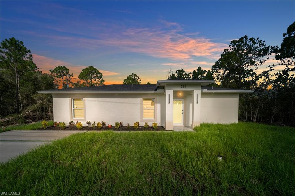 712 Burns AVE S LEHIGH ACRES, FL 33974