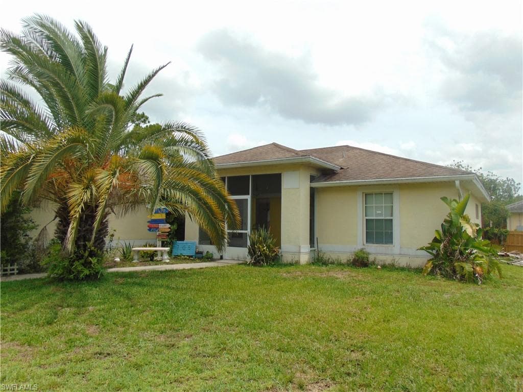 705 W 6th ST LEHIGH ACRES, FL 33972