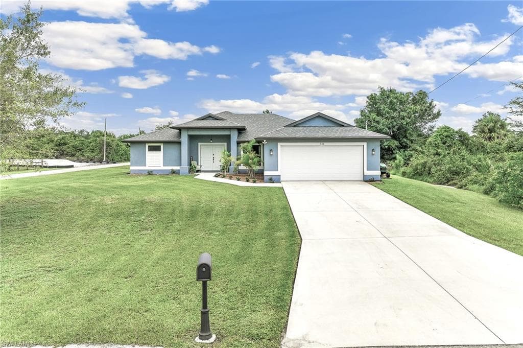 860 Theodore Vail ST E LEHIGH ACRES, FL 33974