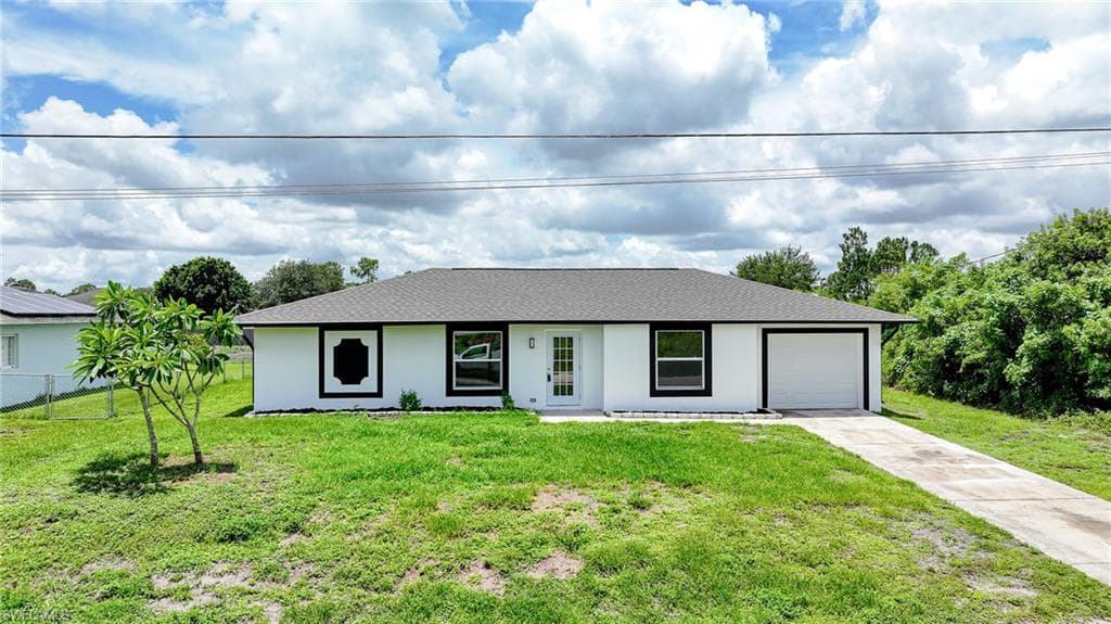 3209 15th ST SW LEHIGH ACRES, FL 33976