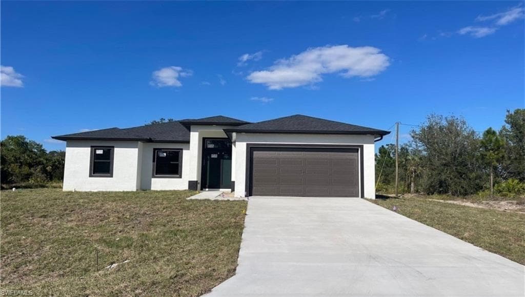 302 8th ST LEHIGH ACRES, FL 33972