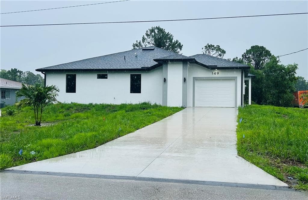 149 Meadow RD LEHIGH ACRES, FL 33973