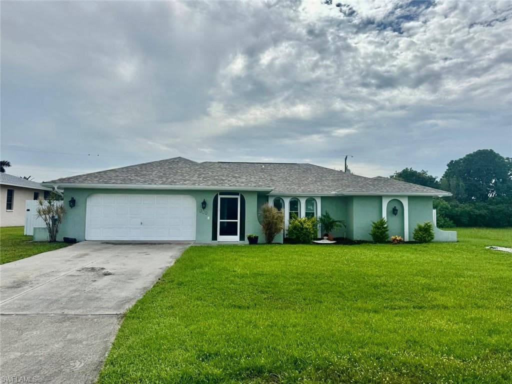 415 SE 12th CT CAPE CORAL, FL 33990