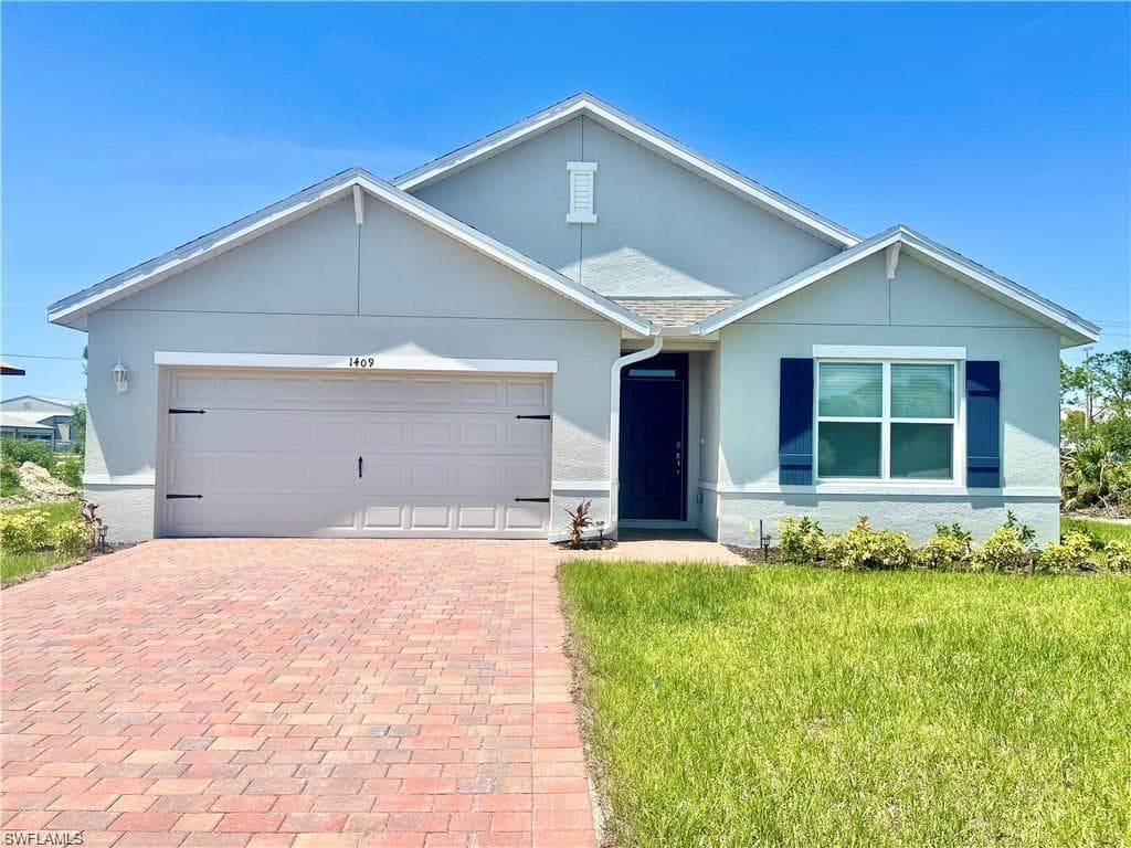 1409 NW 4th ST CAPE CORAL, FL 33993