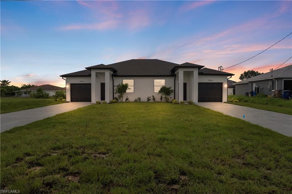 1584/1586 Gretchen AVE S LEHIGH ACRES, FL 33973