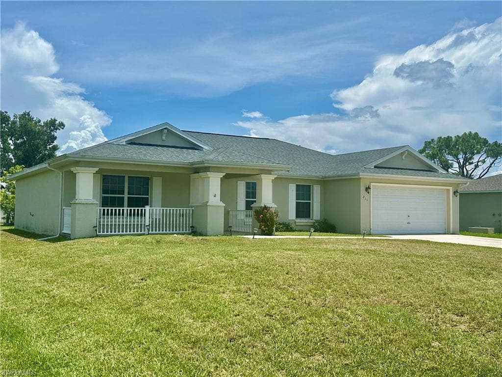211 SW 26th AVE CAPE CORAL, FL 33991