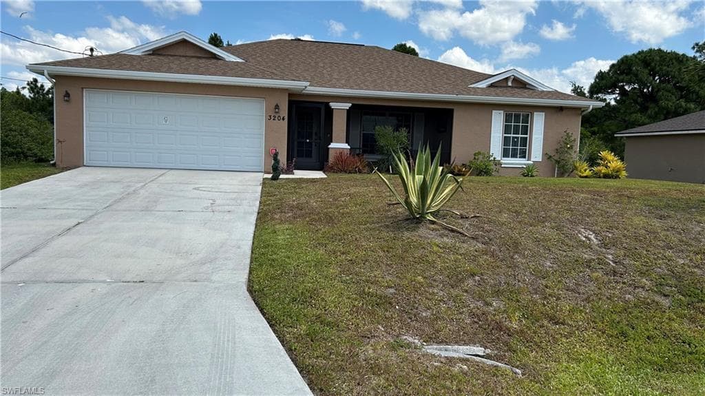 3204 31st ST W LEHIGH ACRES, FL 33971