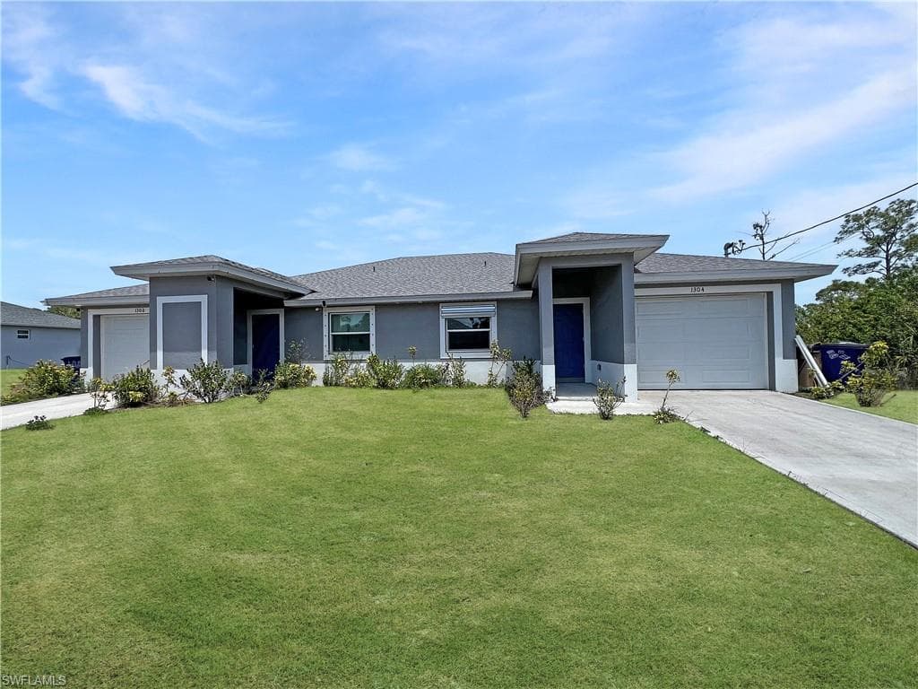 1304 W 12th ST LEHIGH ACRES, FL 33972