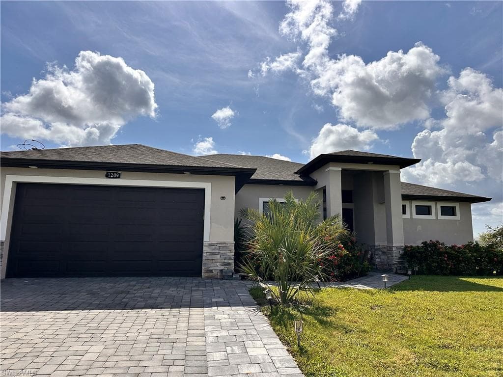 1209 NW 37th AVE CAPE CORAL, FL 33993