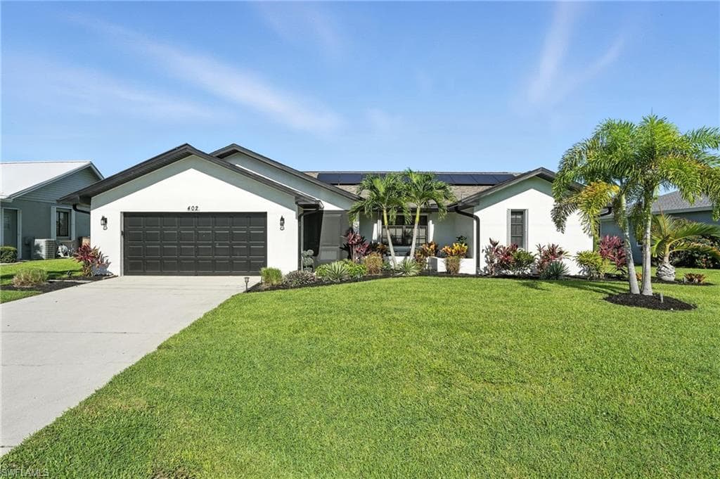 402 SE 8th PL CAPE CORAL, FL 33990