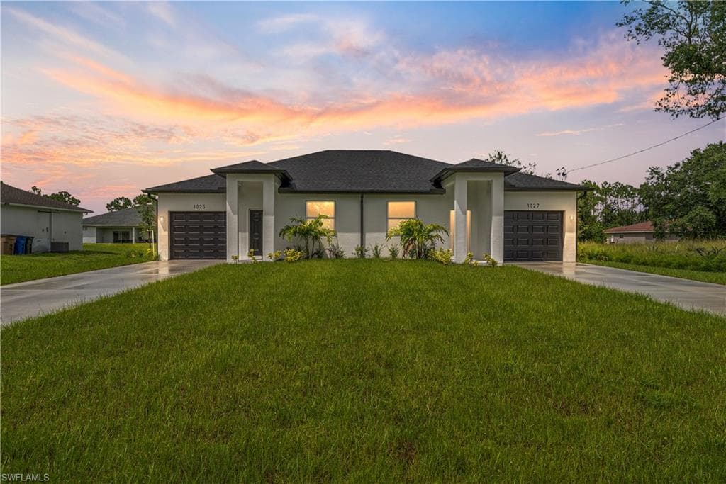 1025/1027 Meadow RD LEHIGH ACRES, FL 33973