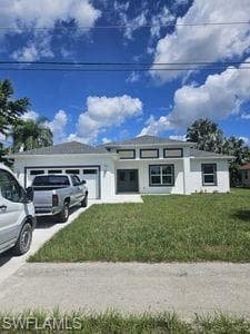 731 Milwaukee BLVD LEHIGH ACRES, FL 33974
