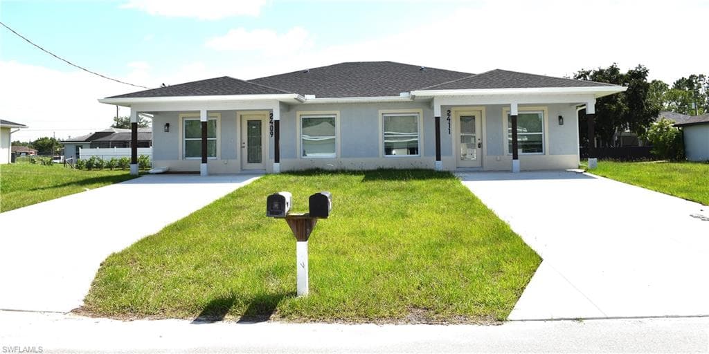 2409/2411 Churchill AVE N LEHIGH ACRES, FL 33971