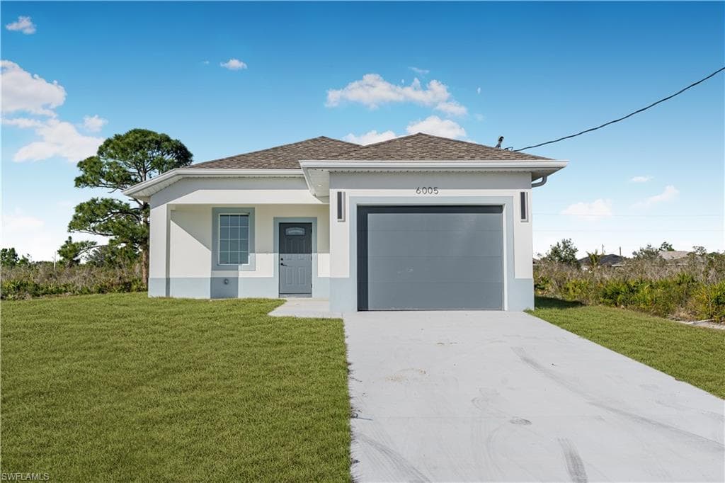 6005 JUNE AVE N LEHIGH ACRES, FL 33971