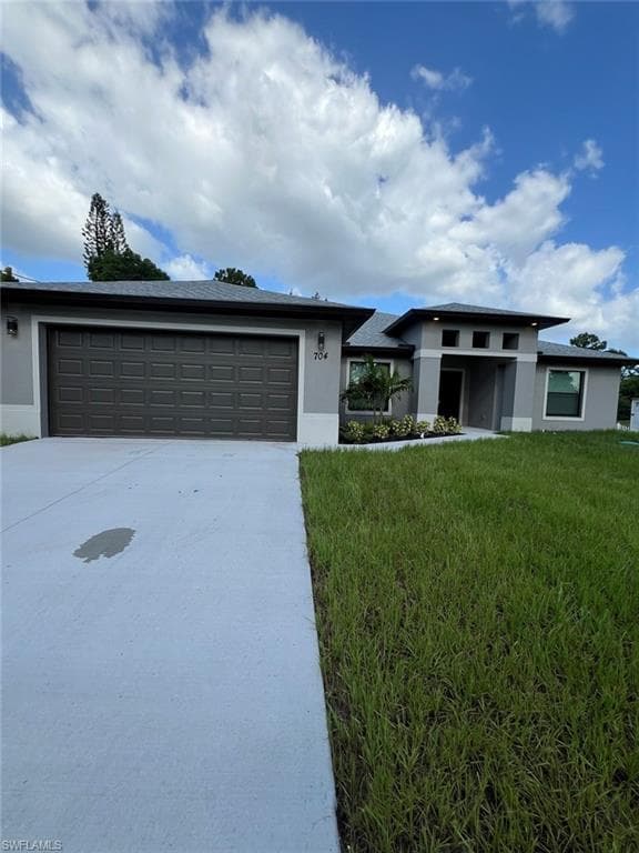 704 Henry AVE LEHIGH ACRES, FL 33972