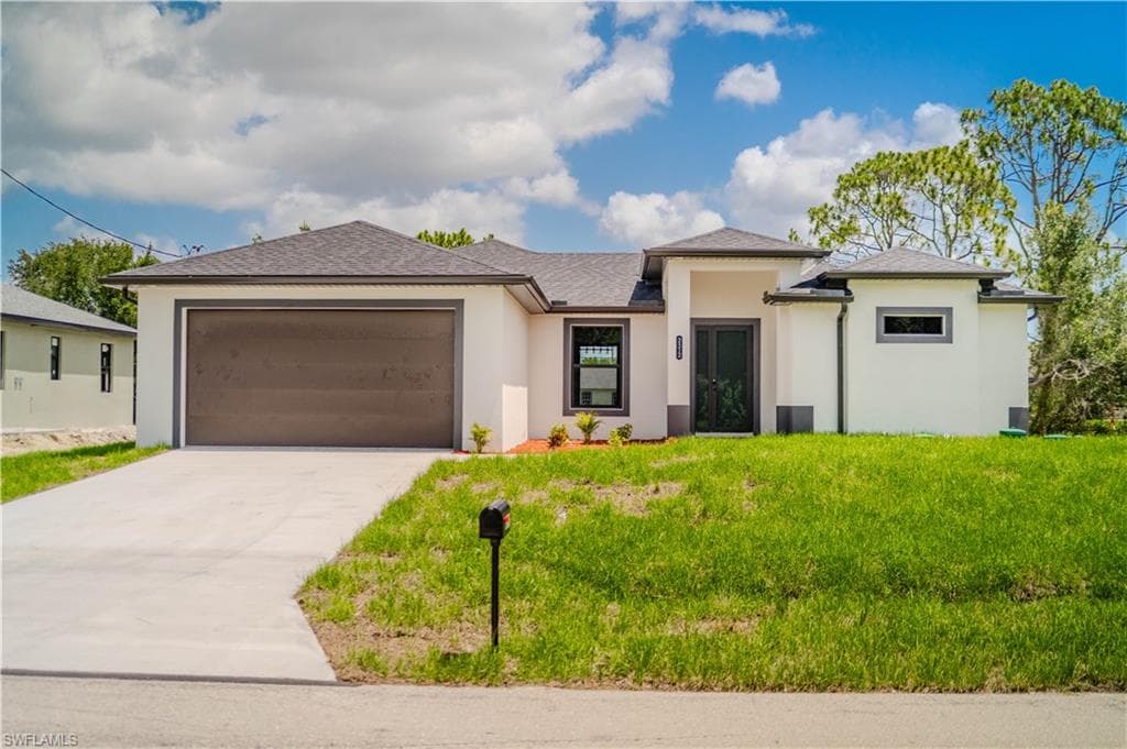 2512 52ND ST SW LEHIGH ACRES, FL 33976