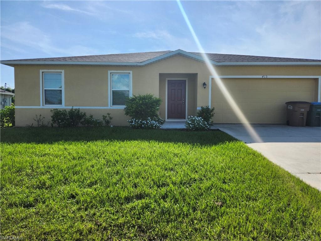 413 SE 13th PL CAPE CORAL, FL 33990