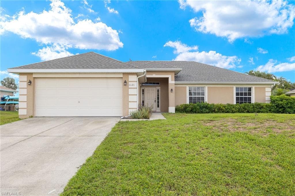 1121 NW 7th AVE CAPE CORAL, FL 33993