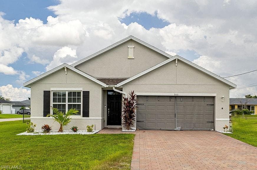 303 NE 6th ST CAPE CORAL, FL 33909