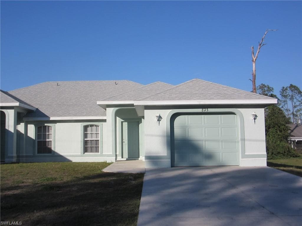 821/823 Meadow RD LEHIGH ACRES, FL 33973