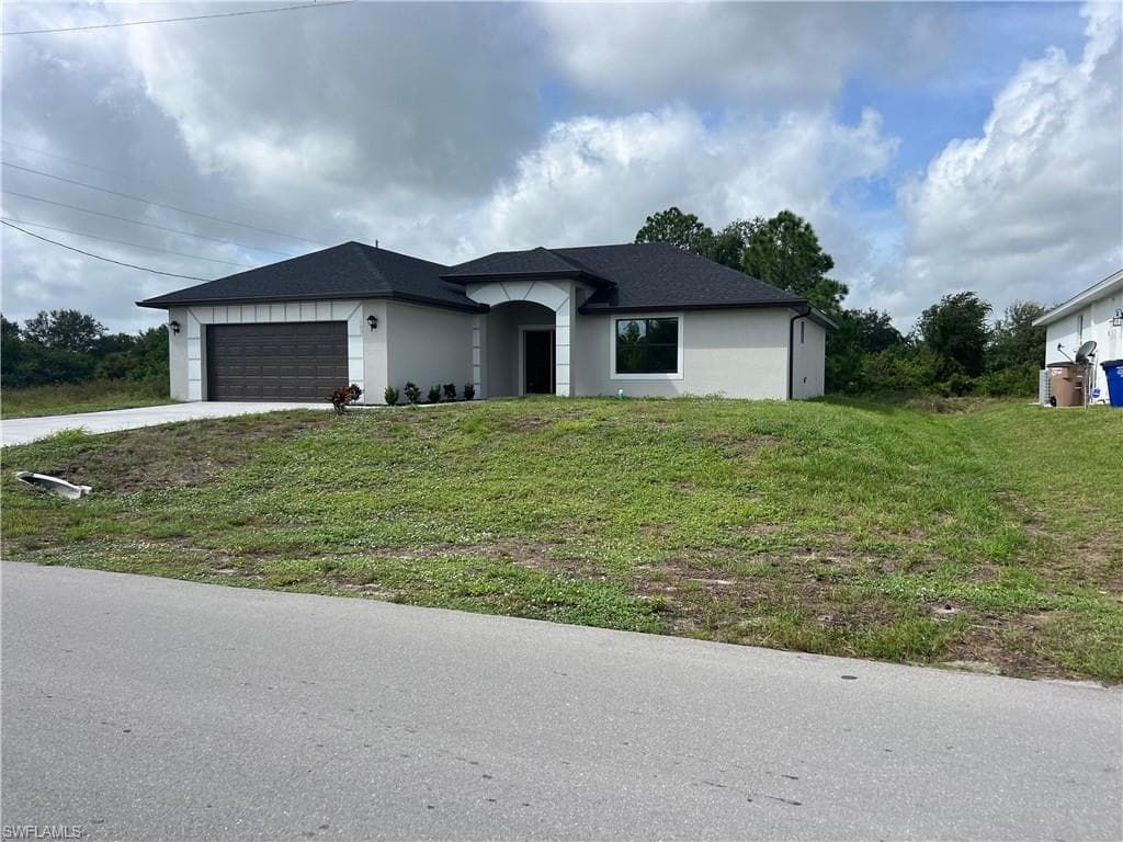 1302 SUNNILAND BLVD LEHIGH ACRES, FL 33971