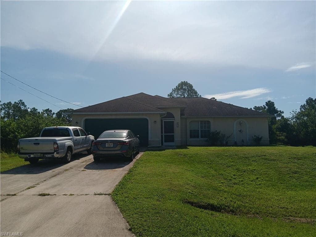 631 Aspen AVE S LEHIGH ACRES, FL 33974