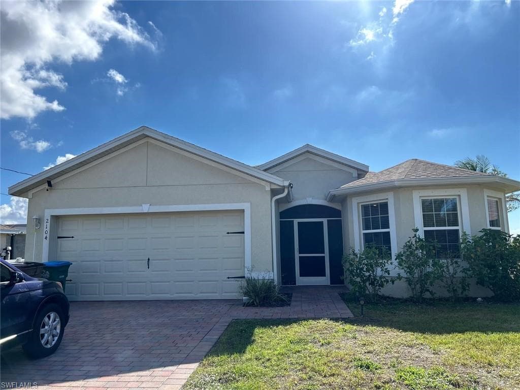 2104 Jacaranda PKWY W CAPE CORAL, FL 33993