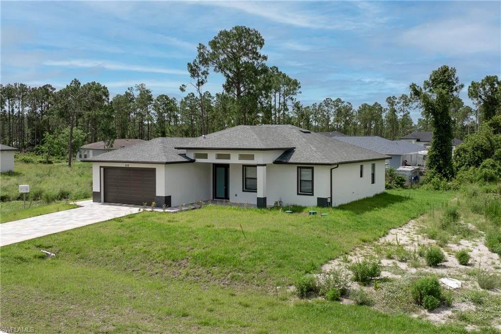 928 Milwaukee BLVD LEHIGH ACRES, FL 33974