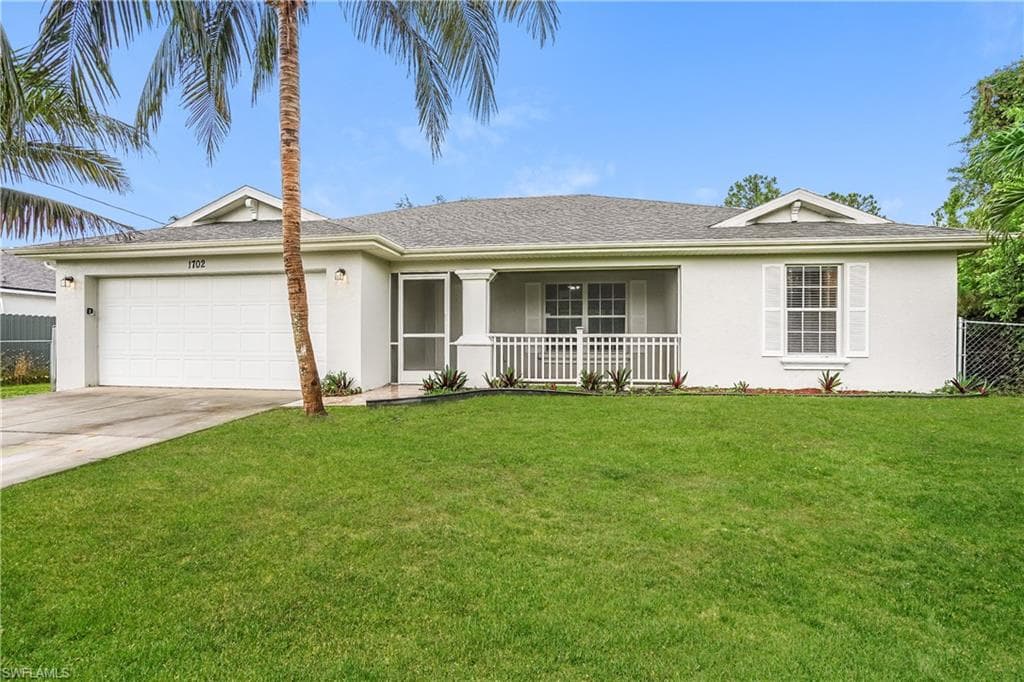 1702 Ann AVE N LEHIGH ACRES, FL 33971