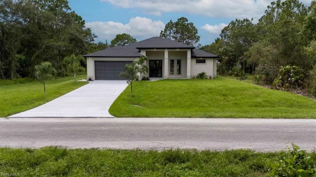 607 McArthur AVE LEHIGH ACRES, FL 33936