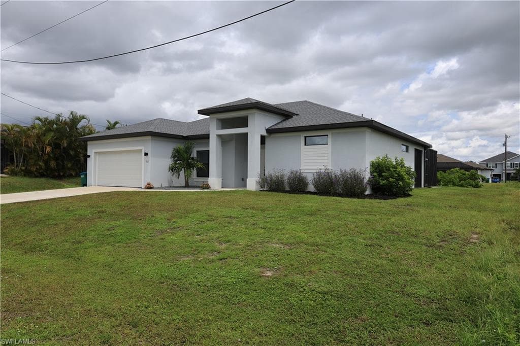 703 SW 26th TER CAPE CORAL, FL 33914