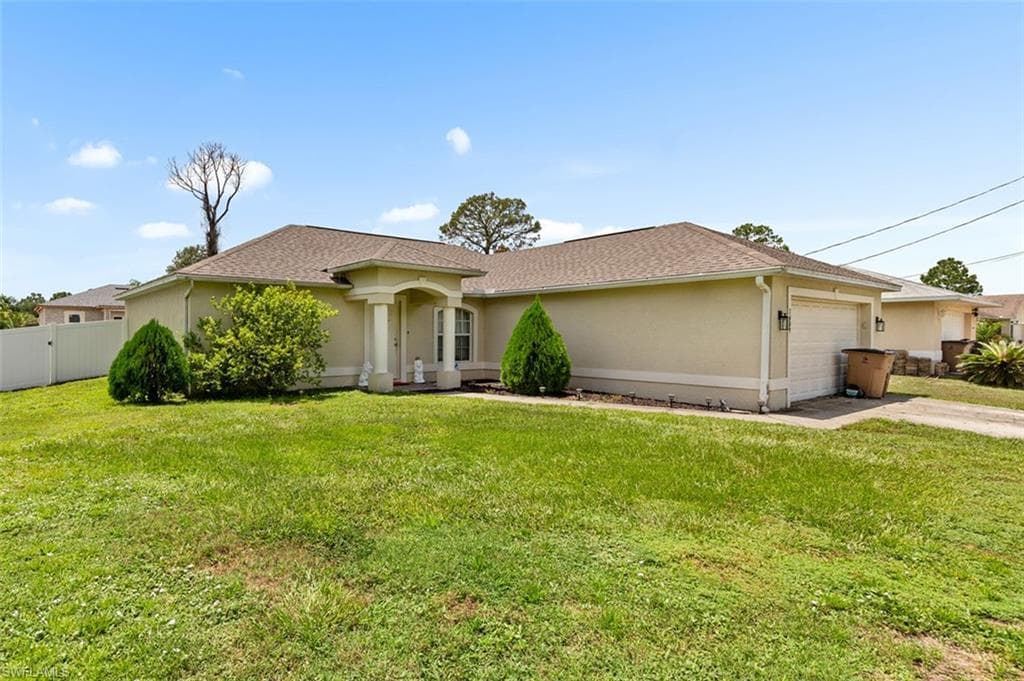 3309 19th ST W LEHIGH ACRES, FL 33971