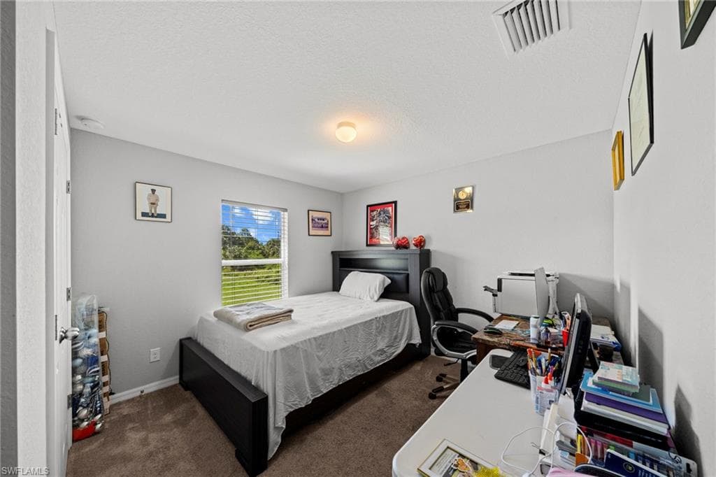 2408 Carvell AVE N LEHIGH ACRES, FL 33971