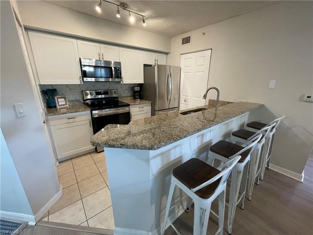 8870 Colonnades CT W 312 BONITA SPRINGS, FL 34135
