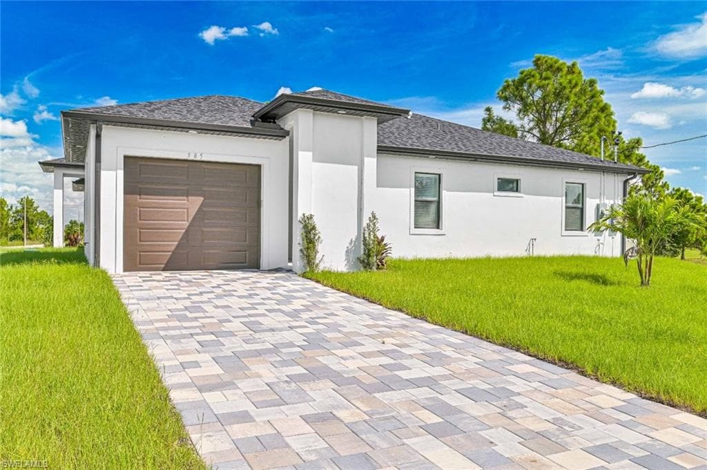 585/587 Alabama RD S LEHIGH ACRES, FL 33974
