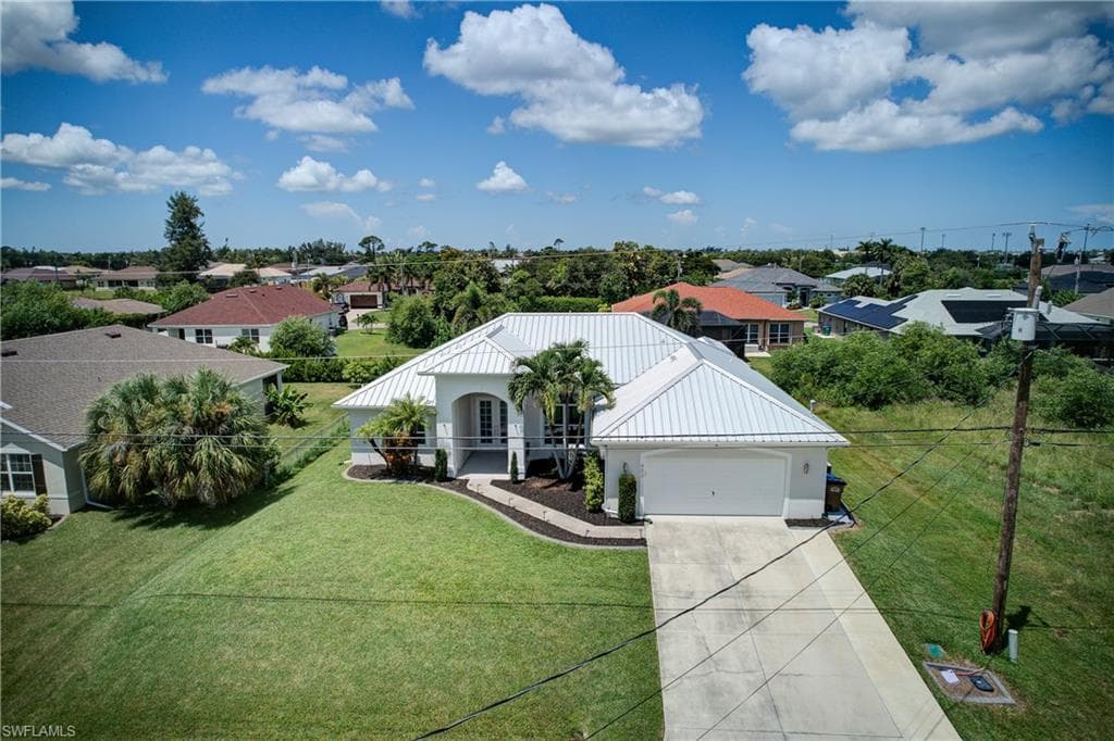 402 SW 25th PL CAPE CORAL, FL 33991