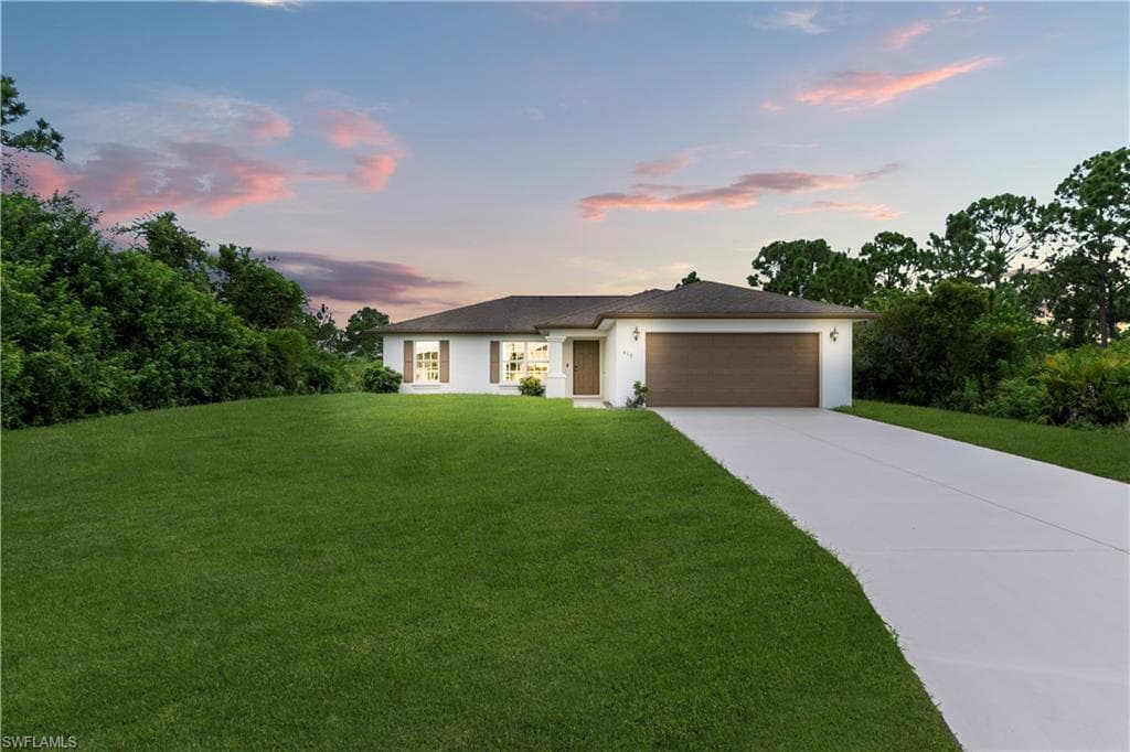 418 Palmyra AVE LEHIGH ACRES, FL 33974