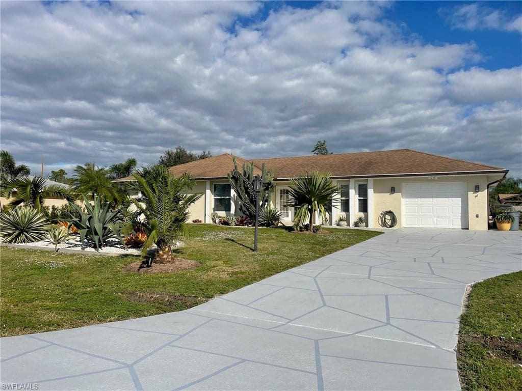 306 5TH AVE LEHIGH ACRES, FL 33936