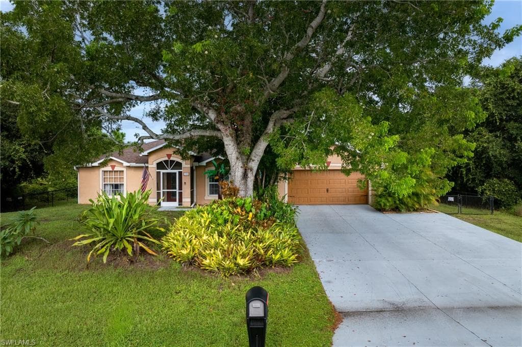 705 Magnolia AVE LEHIGH ACRES, FL 33972