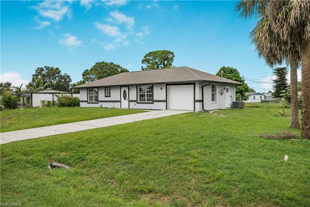 803 Monroe DR LEHIGH ACRES, FL 33936