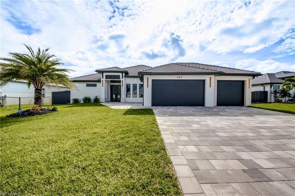 607 SW 18th CT CAPE CORAL, FL 33991