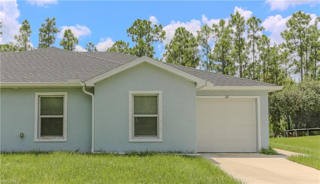 309 Norwalk AVE LEHIGH ACRES, FL 33972