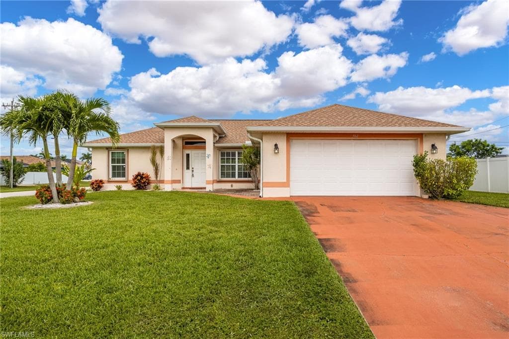 302 NE 24th AVE CAPE CORAL, FL 33909