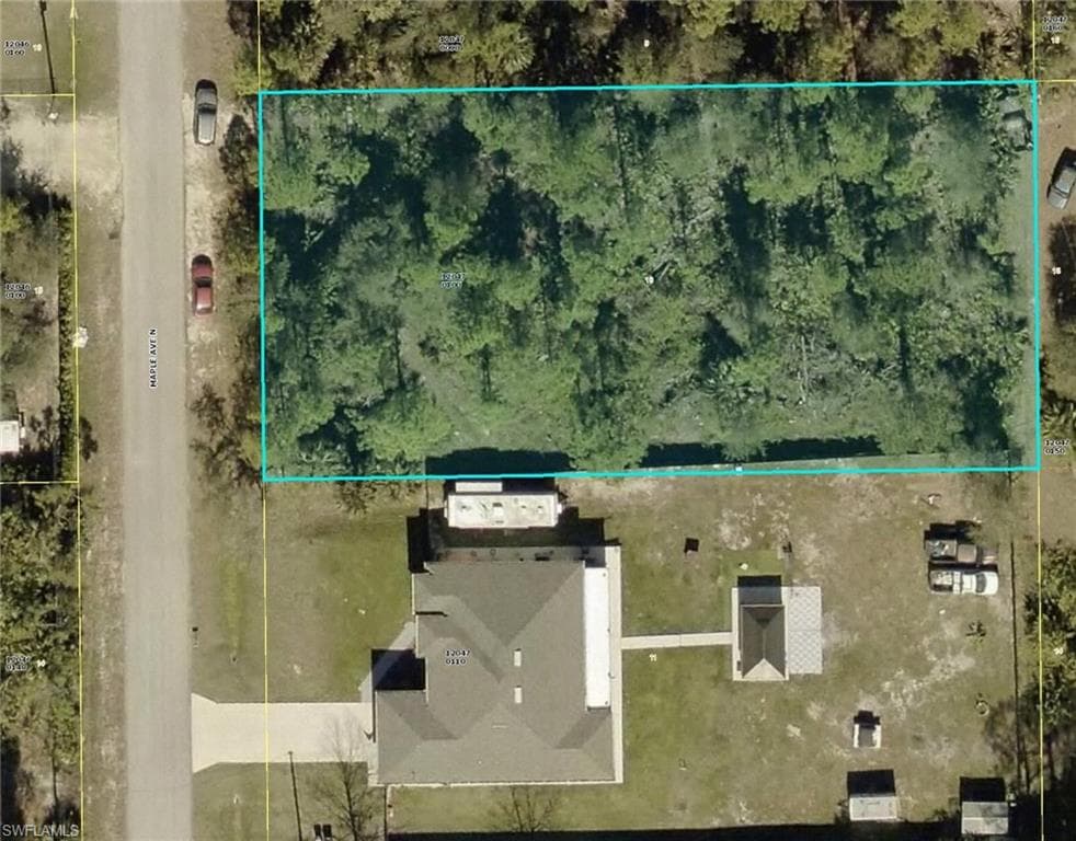 704 Maple AVE N LEHIGH ACRES, FL 33972